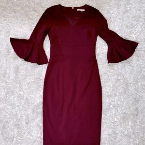 Trina Turk maroon sheath dress with tulip sleeves